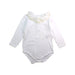 A White Long Sleeve Bodysuits from Bonpoint in size 2T for girl. (Front View)
