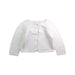 A White Cardigans from Jacadi in size 6-12M for girl. (Front View)