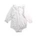 A White Long Sleeve Bodysuits from Paz Rodriguez in size 6-12M for girl. (Back View)