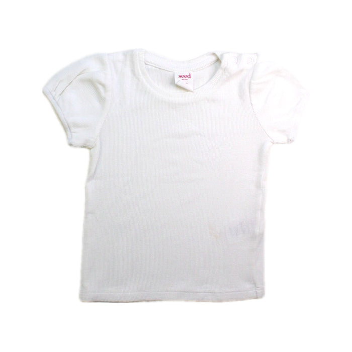 A White Short Sleeve T Shirts from Seed in size 12-18M for girl. (Front View)