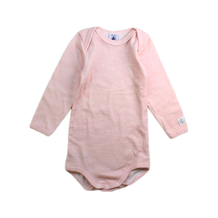 A Pink Long Sleeve Bodysuits from Petit Bateau in size 12-18M for girl. (Front View)