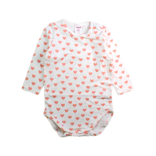 A White Long Sleeve Bodysuits from Seed in size 6-12M for girl. (Front View)