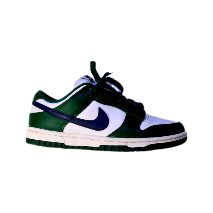A Green Sneakers from Nike in size 11Y for boy. (Front View)