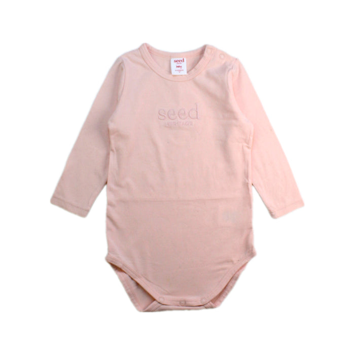 A Pink Long Sleeve Bodysuits from Seed in size 6-12M for girl. (Front View)
