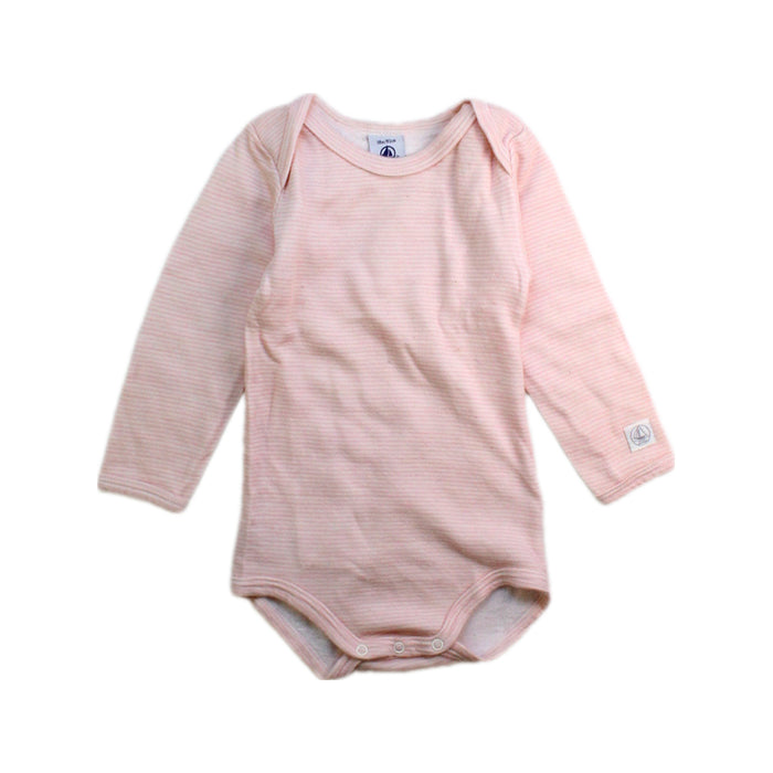 A Pink Long Sleeve Bodysuits from Petit Bateau in size 12-18M for girl. (Front View)