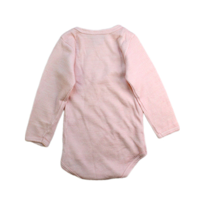 A Pink Long Sleeve Bodysuits from Petit Bateau in size 12-18M for girl. (Back View)