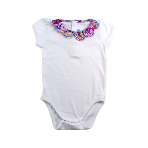 A White Short Sleeve Bodysuits from Jacadi in size 6T for girl. (Front View)