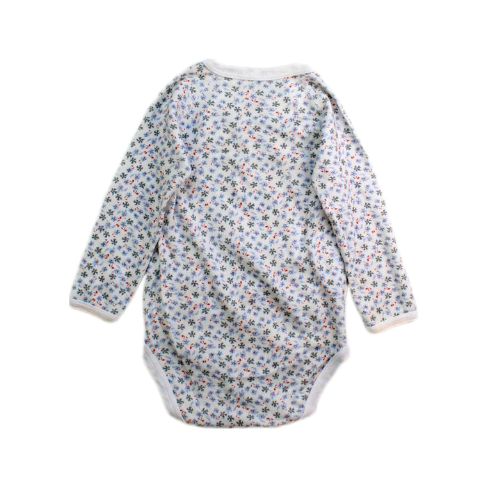 A White Long Sleeve Bodysuits from Petit Bateau in size 6-12M for girl. (Back View)