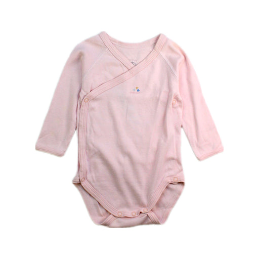 A Pink Long Sleeve Bodysuits from Petit Bateau in size 3-6M for girl. (Front View)