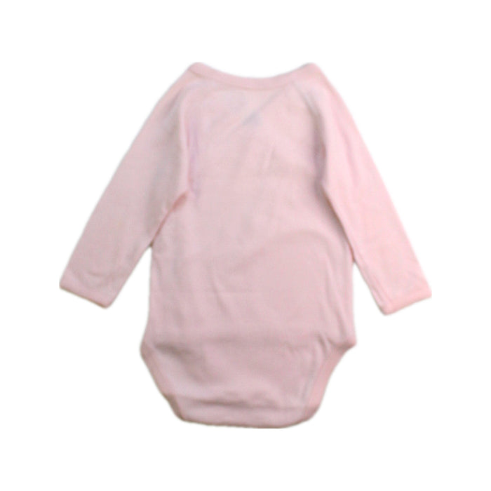 A Pink Long Sleeve Bodysuits from Petit Bateau in size 3-6M for girl. (Back View)