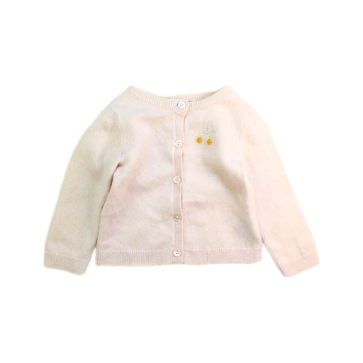 A Ivory Cardigans from Bonpoint in size 6-12M for girl. (Front View)
