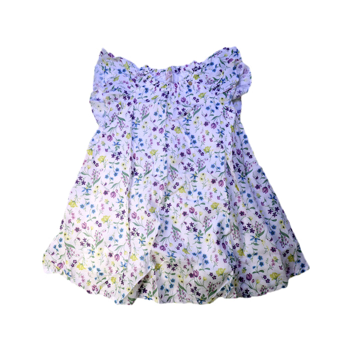 A White Sleeveless Dresses from Petit Main in size 7Y for girl. (Front View)