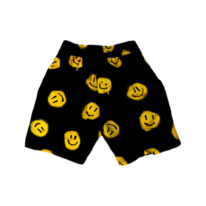 A Black Shorts from Molo in size 4T for boy. (Back View)
