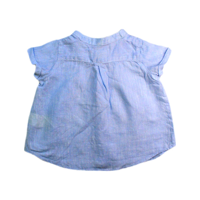 A Blue Short Sleeve Shirts from Nanos in size 3-6M for girl. (Back View)