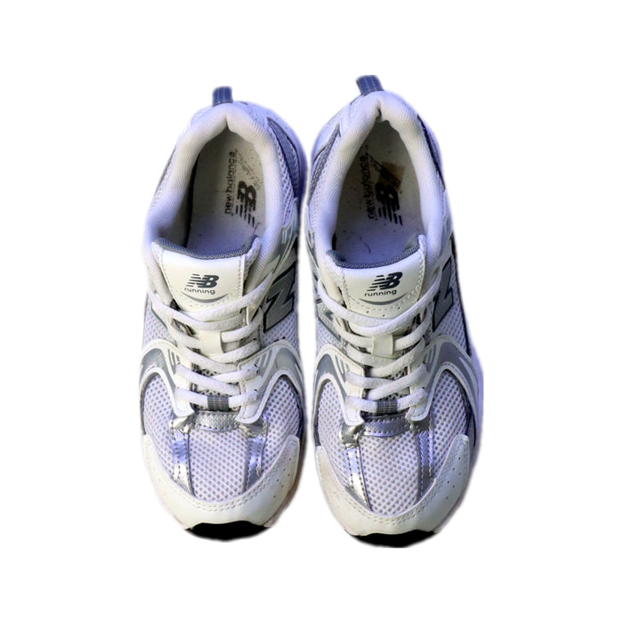 A White Sneakers from New Balance in size 9Y for neutral. (Back View)