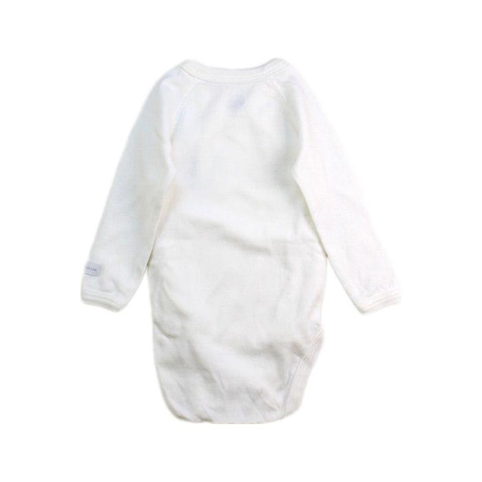 A White Long Sleeve Bodysuits from Petit Bateau in size 0-3M for neutral. (Back View)