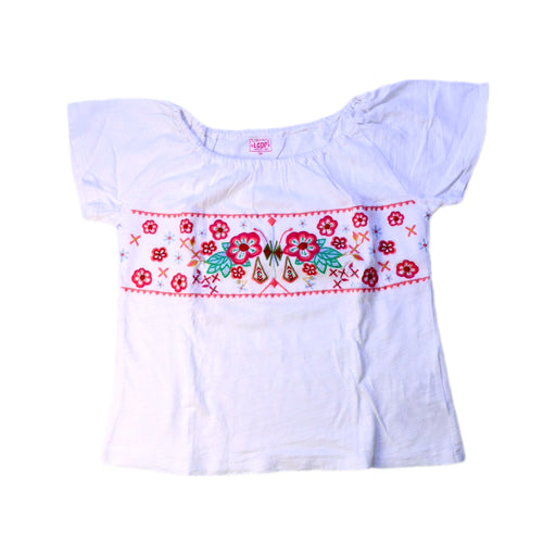 A White Short Sleeve Tops from La Compagnie des Petits in size 6T for girl. (Front View)