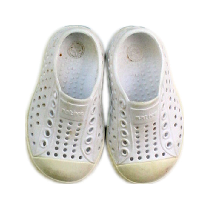 A White Slip Ons from Native Shoes in size 12-18M for neutral. (Back View)