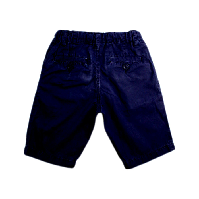 A Navy Shorts from Petit Bateau in size 5T for boy. (Back View)