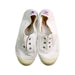 A White Slip Ons from Cienta in size 6T for girl. (Back View)