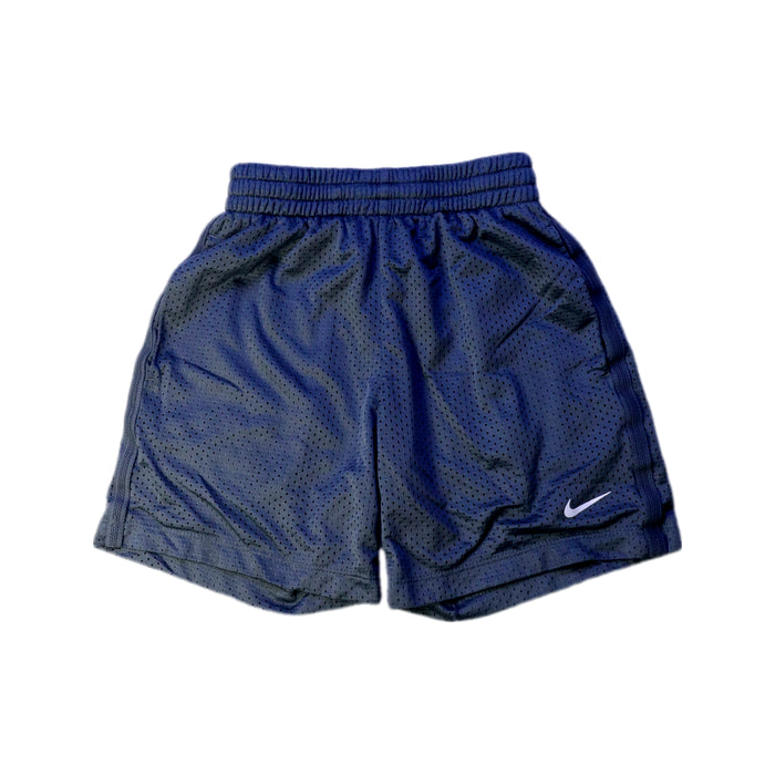 A Navy Shorts from Nike in size 5T for boy. (Front View)