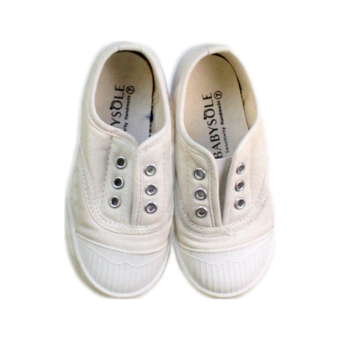 A White Slip Ons from Baby Sole in size 18-24M for neutral. (Back View)