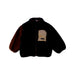 A Black Puffer/Quilted Jackets from Petit Main in size 18-24M for boy. (Front View)