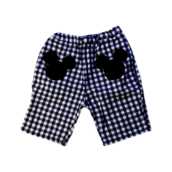 A Black Shorts from Petit Main in size 18-24M for boy. (Front View)
