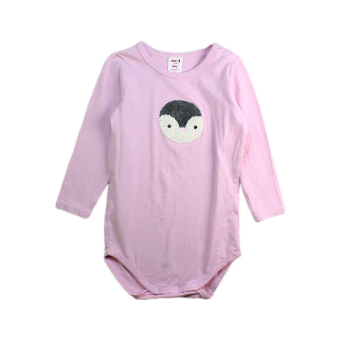 A Pink Long Sleeve Bodysuits from Seed in size 12-18M for girl. (Front View)