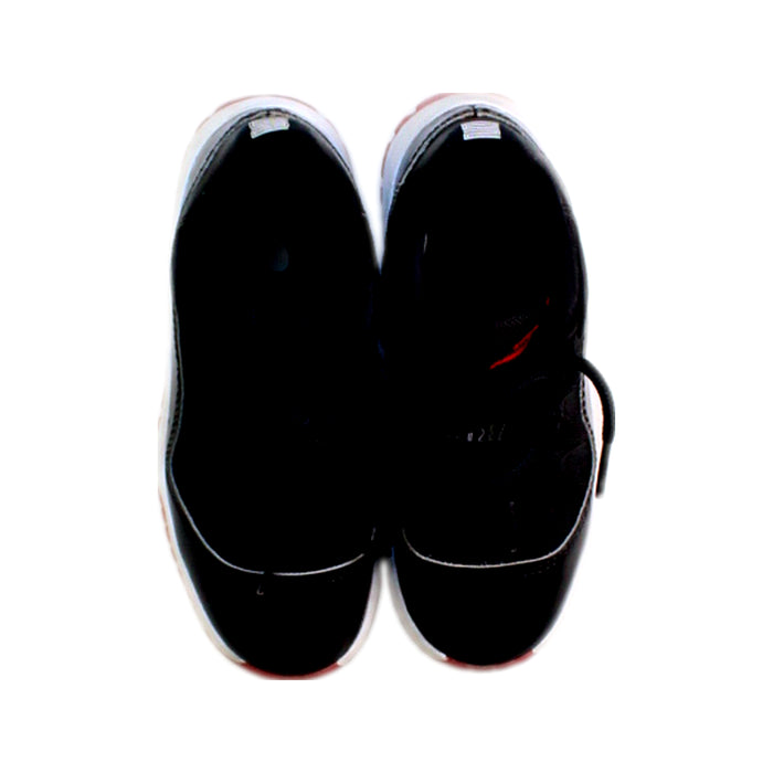 A Black Sneakers from Nike in size 5T for boy. (Back View)