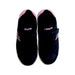 A Black Sneakers from Levi's in size 7Y for girl. (Back View)