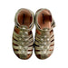 A Gold Sandals from Petit Nord in size 6T for girl. (Back View)