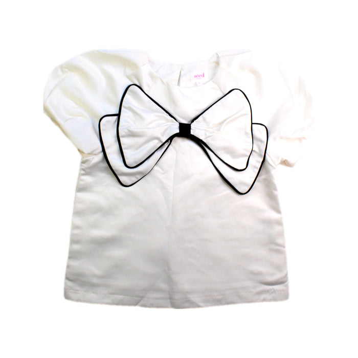A White Short Sleeve Tops from Seed in size 6T for girl. (Front View)