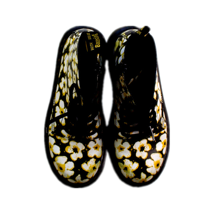 A Black Casual Boots from Dr. Martens in size 7Y for girl. (Back View)