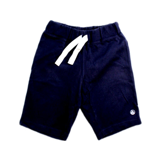 A Navy Shorts from Petit Bateau in size 4T for boy. (Front View)