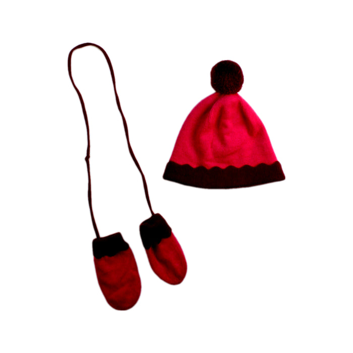 A Pink Winter Hats from Jacadi in size 2T for girl. (Front View)