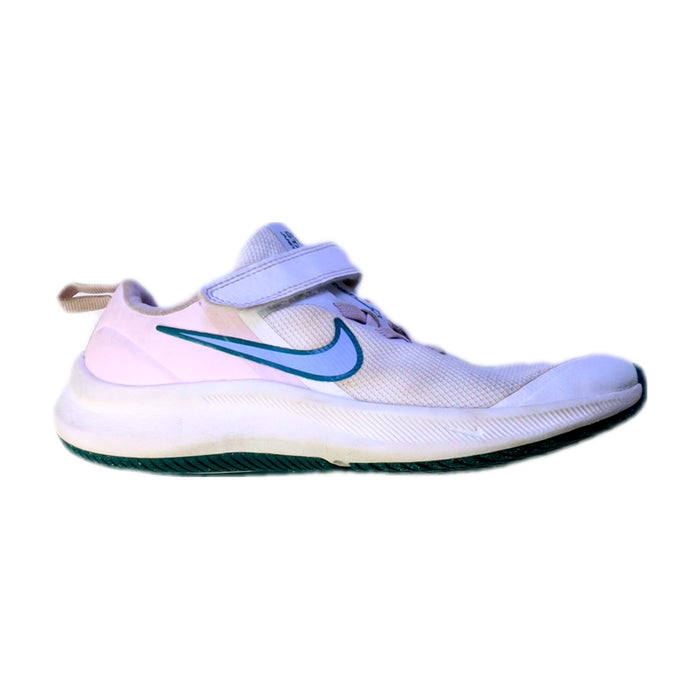 A White Sneakers from Nike in size 7Y for girl. (Front View)