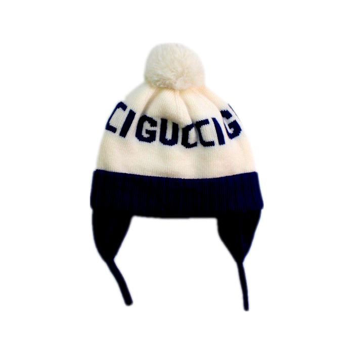 A White Winter Hats from Gucci in size 6-12M for boy. (Front View)
