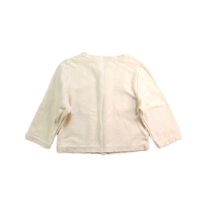 A Ivory Cardigans from Petit Bateau in size 12-18M for girl. (Back View)