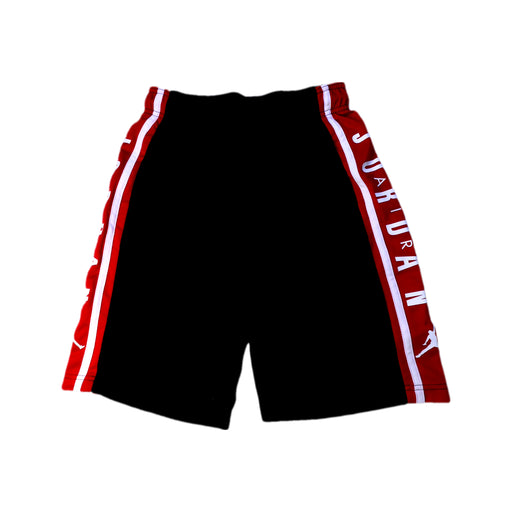 A Black Shorts from Air Jordan in size 12Y for boy. (Front View)