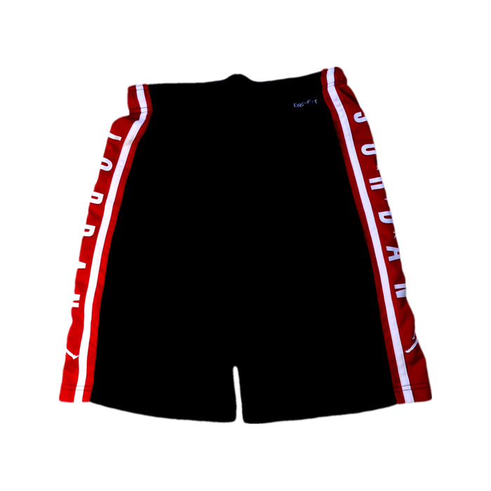 A Black Shorts from Air Jordan in size 14Y for boy. (Back View)