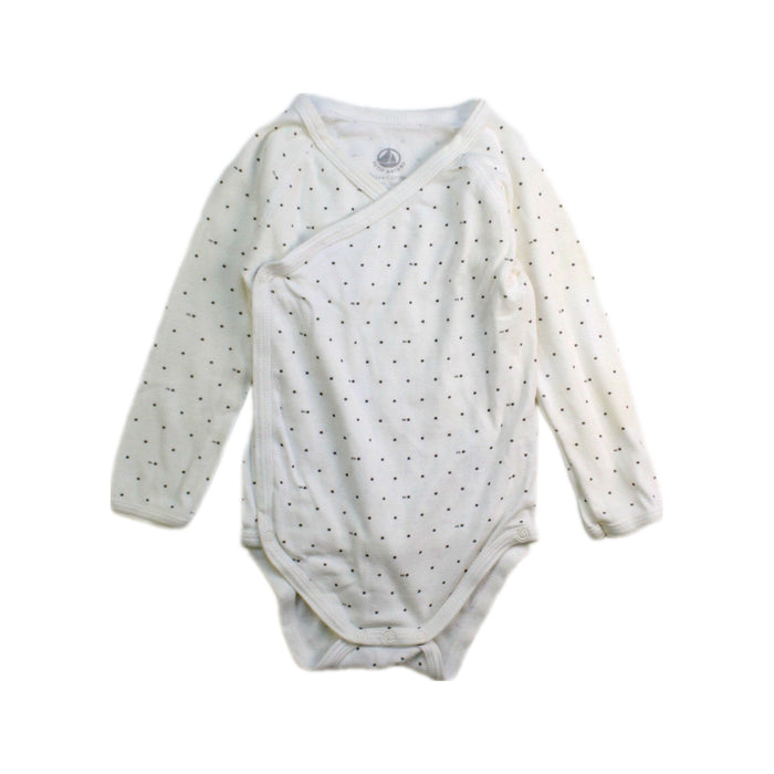 A White Long Sleeve Bodysuits from Petit Bateau in size 6-12M for neutral. (Front View)