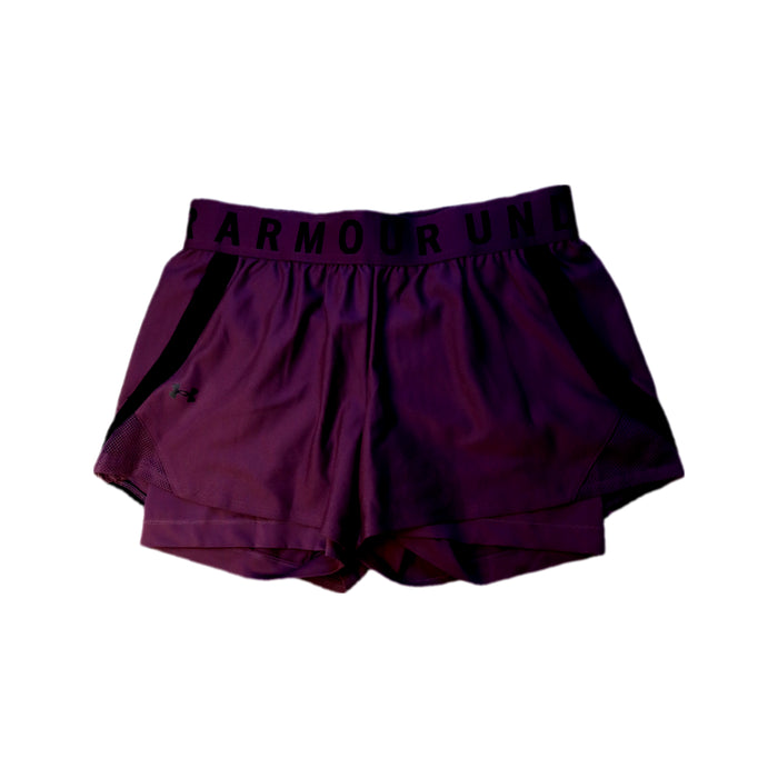 A Purple Active Shorts from Under Armour in size 14Y for girl. (Front View)