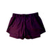 A Purple Active Shorts from Under Armour in size 14Y for girl. (Front View)