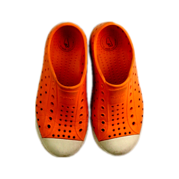 A Orange Slip Ons from Native Shoes in size 6T for neutral. (Back View)