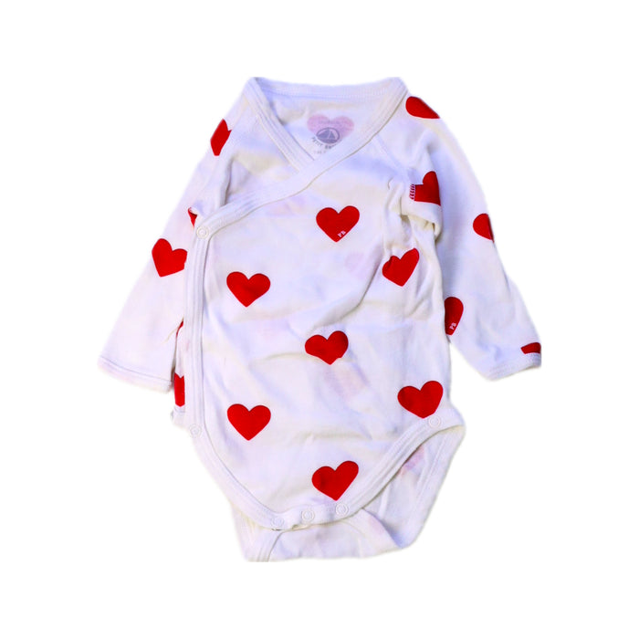 A Red Long Sleeve Bodysuits from Petit Bateau in size 0-3M for girl. (Front View)