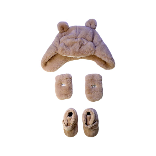 A Beige Booties from UGG in size Newborn for neutral. (Front View)