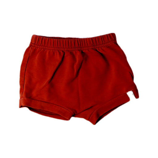 A Orange Shorts from bonnie & the gang in size 6-12M for boy. (Front View)