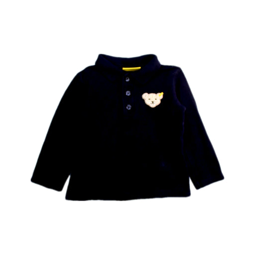 A Navy Long Sleeve Polos from Steiff in size 6-12M for girl. (Front View)