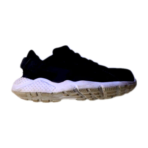 A Black Sneakers from Nike in size 4T for neutral. (Front View)